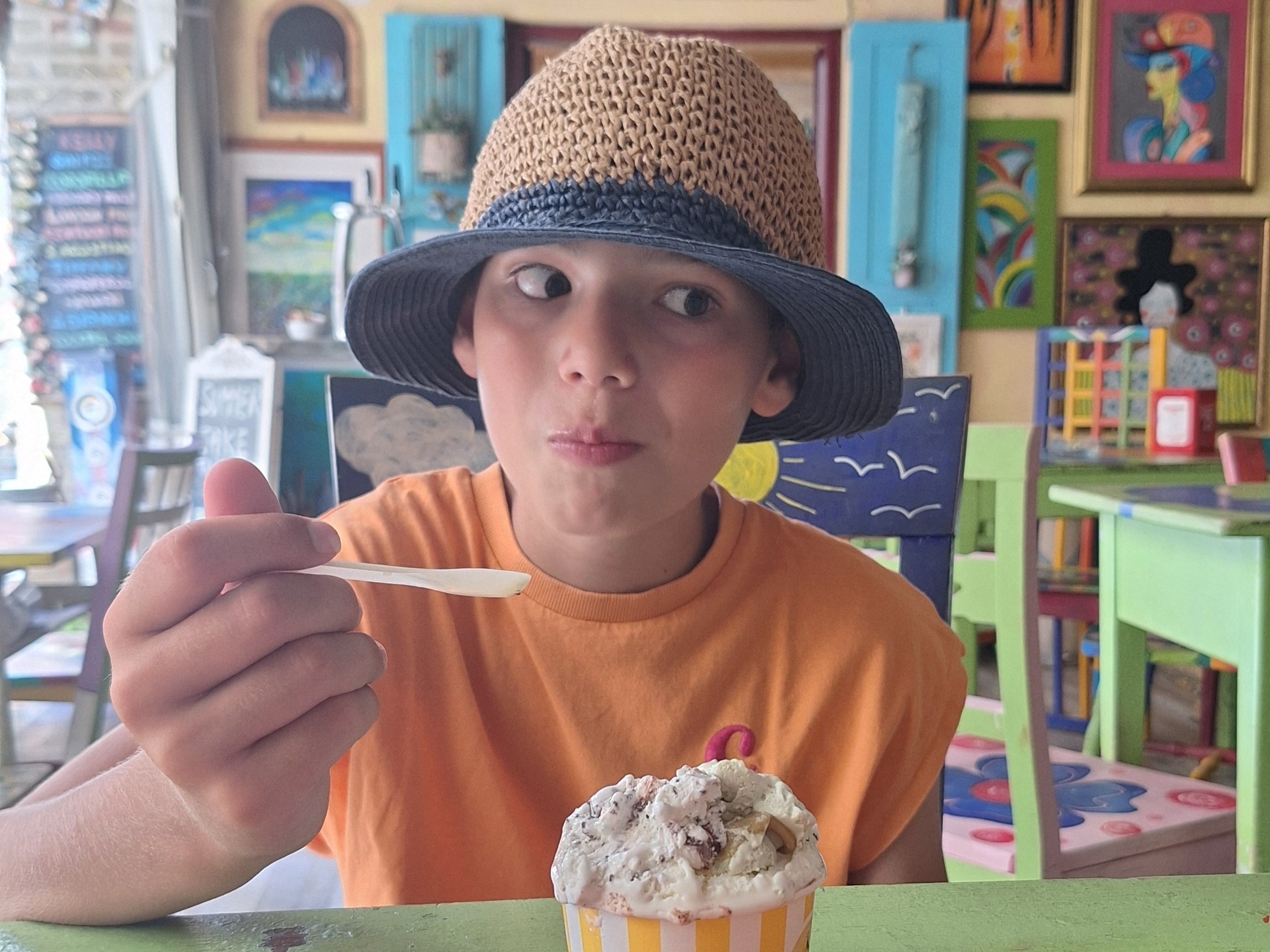 Sam eating an icne cream in Torre di Palme